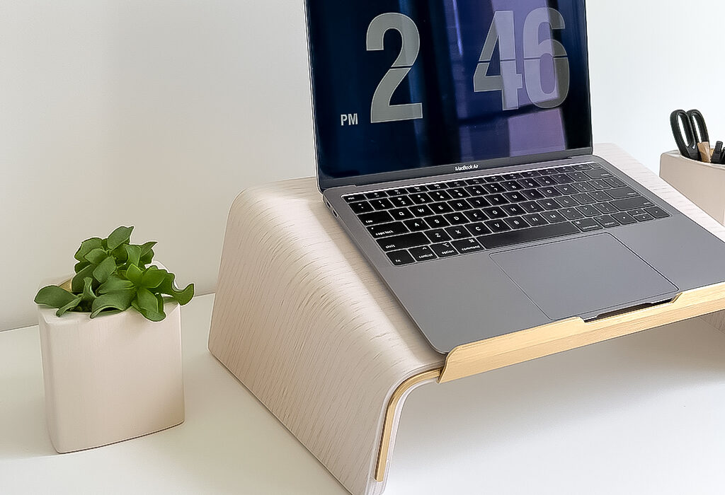 A laptop stand can increase productivity